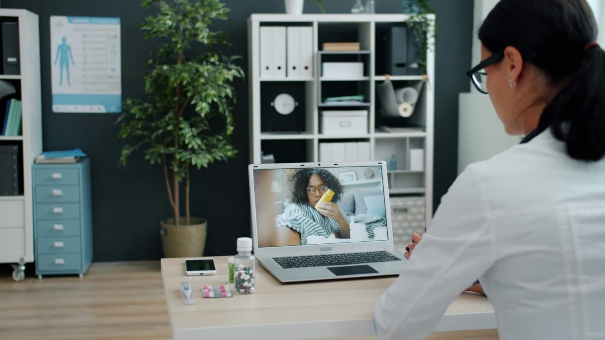 Provider reviewing labs over a telehealth video call